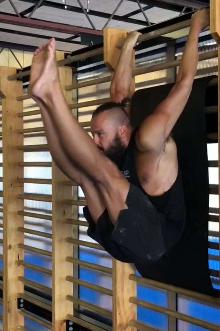 Photo of adults doing gymnastics strength training classes focused on strength training, mobility training, and skill training.