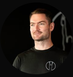 Dan Arnold, founder of Falsegrip, coaching adult gymnastics strength and mobility in Sydney
